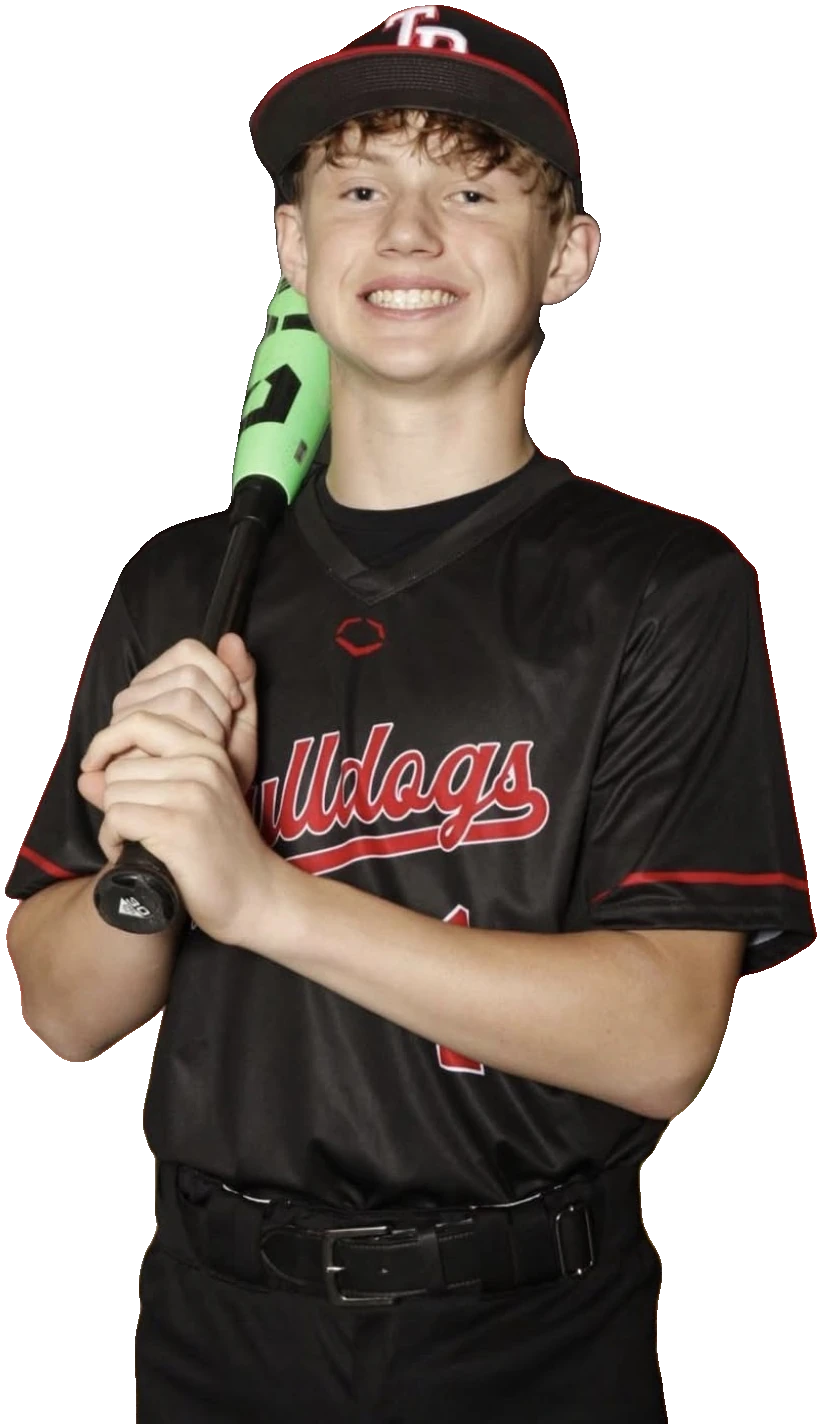 Carter Burhans with a bat in his Tinley Bulldogs baseball uniform